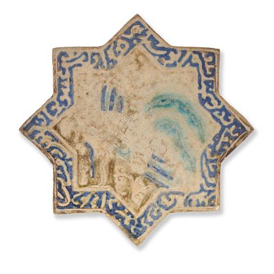 A Kashan Lustre Moulded Pottery Star Tile Persia, Late 13th – Early 14th Century