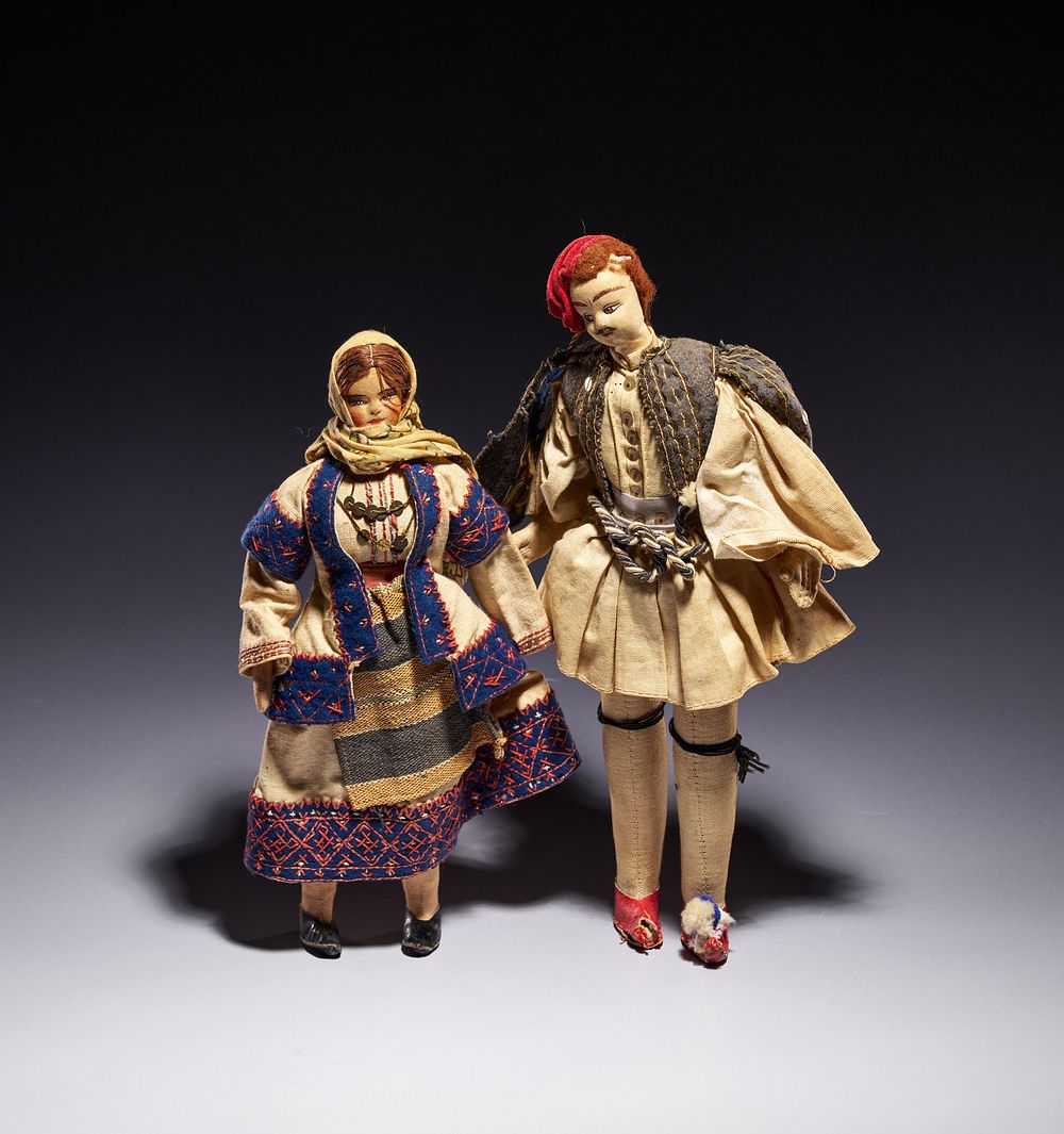 Lot 328: A PAIR OF VINTAGE GREEK FOLK SOUVENIR DOLLS IN TRADITIONAL REGIONAL COSTUMES