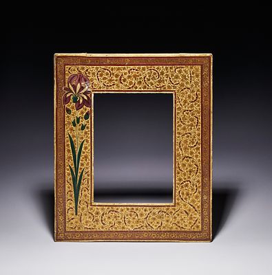 A KASHMIRI PICTURE FRAME WITH IRIS AND FLORAL SCROLL DECORATION, INDIA, 19TH CENTURY. The 