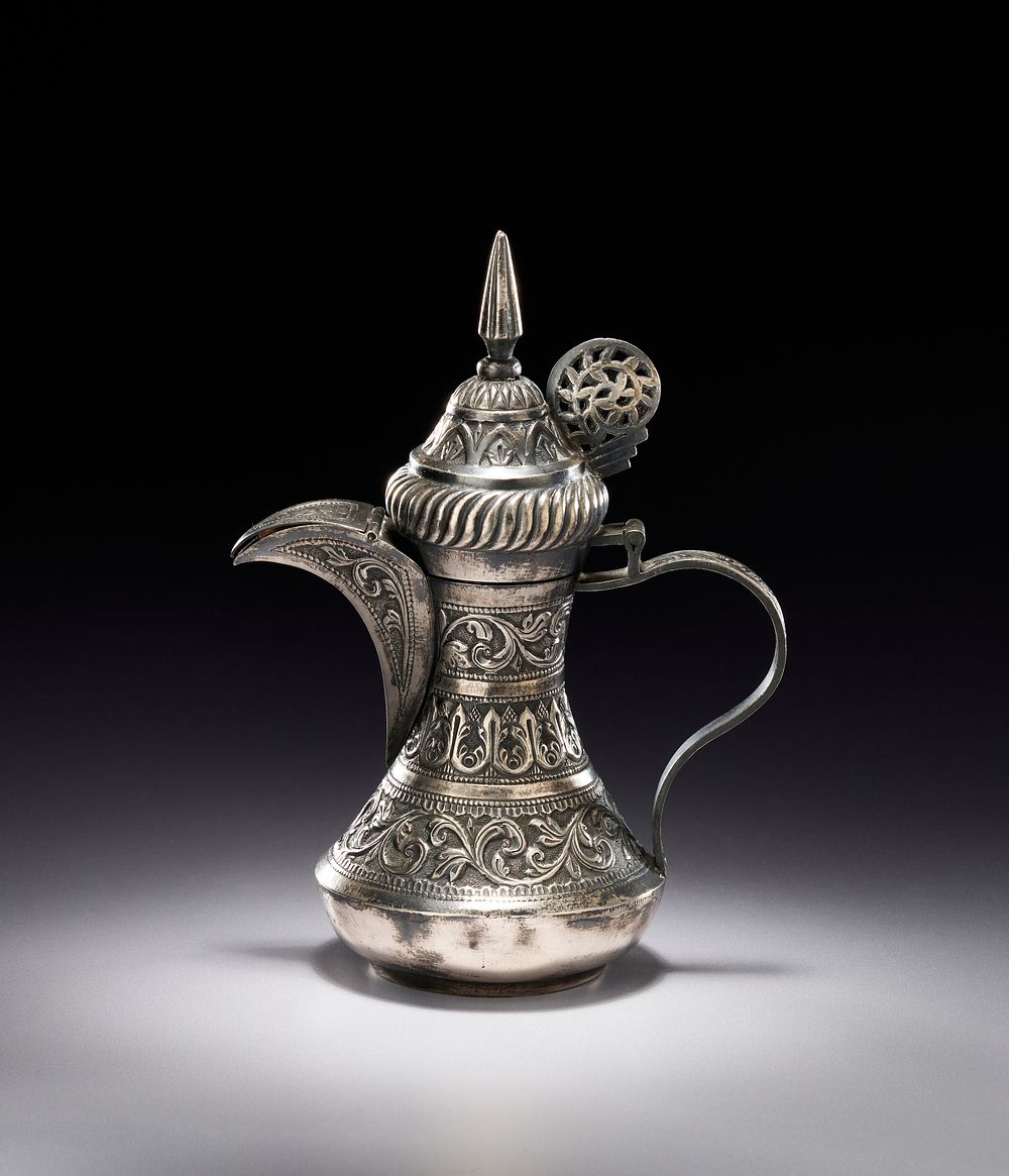 Lot 189: A SILVER ARABIC COFFEE POT DALLA, 20TH CENTURY