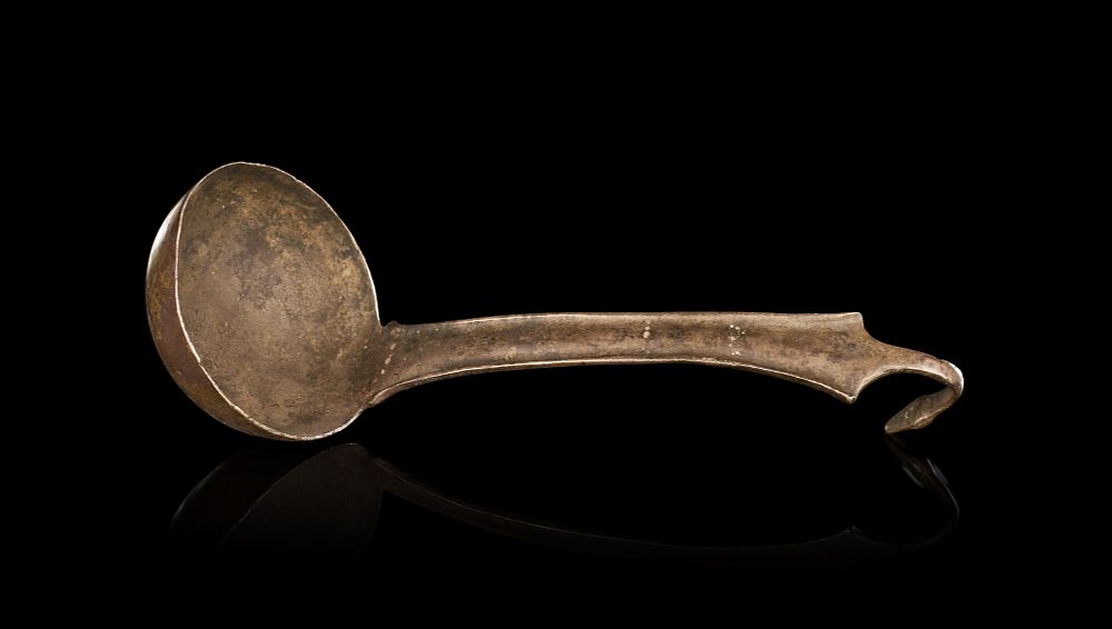 Lot 329: AN ANCIENT ROMAN CAST BRONZE LADLE WITH ZOOMORPHIC TERMINAL