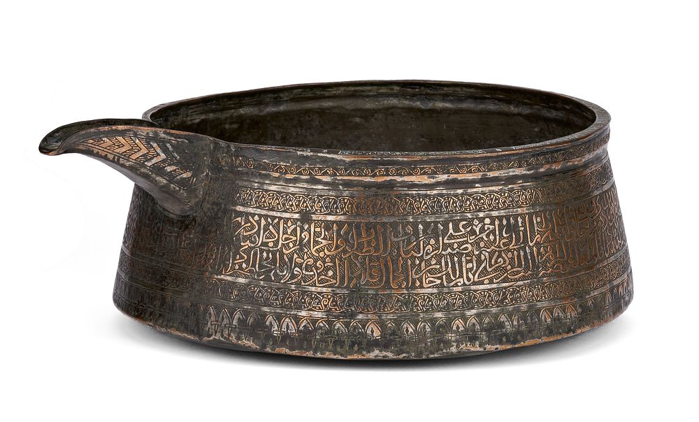 Lot 210: A MAMLUK TINNED COPPER POURING VESSEL, EGYPT OR SYRIA, 15TH CENTURY