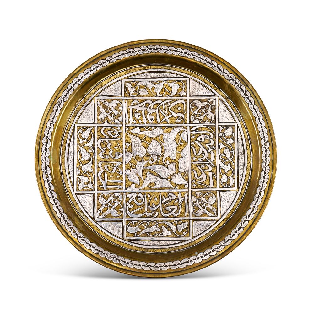 Lot 203: A CAIRO WARE SILVER-INLAID BRASS CHARGER, CIRCA 1900S