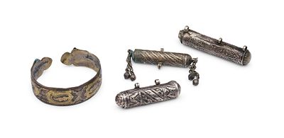 A Collection of Islamic Silver Cuff Bracelet and Three Taweez Amulet Pendants, 19th Century