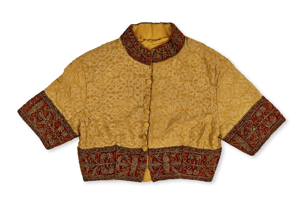 Lot 355: AN EMBROIDERED SILK AND VELVET CHILD SHORT JACKET, OTTOMAN OR ANATOLIAN, EARLY 19TH CENTURY
