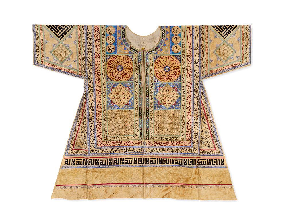 Lot 358: AN OTTOMAN TALISMANIC SHIRT (JAMA) PAINTED WITH RELIGIOUS INSCRIPTIONS, TURKEY, 19TH CENTURY