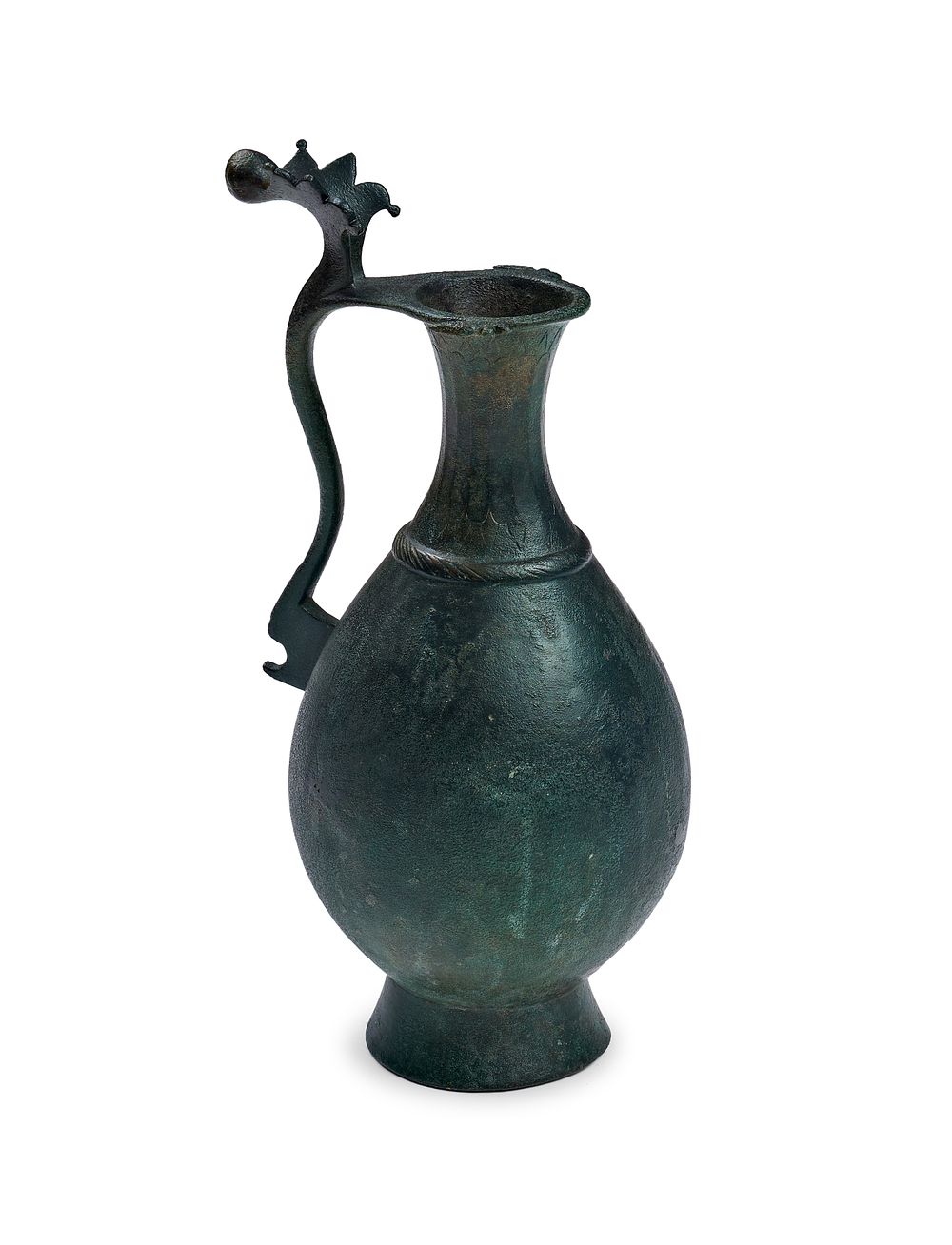 Lot 173: AN UMAYYAD OR EARLY ABBASID BRONZE EWER, 8TH - 9TH CENTURY