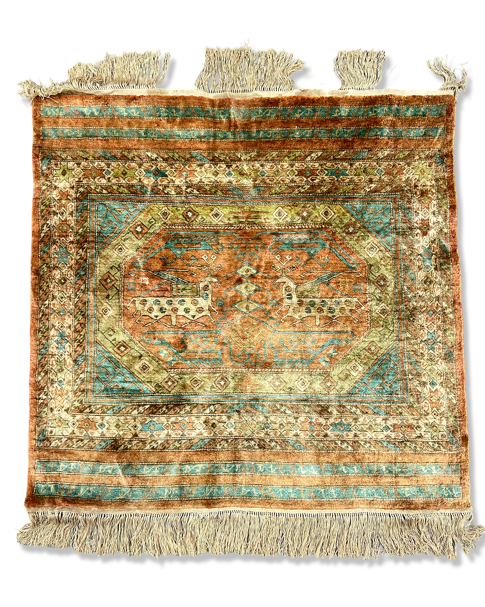Lot 370: A HAND-KNOTTED PERSIAN SILK RUG WITH CENTRAL ZOOMORPHIC MEDALLION