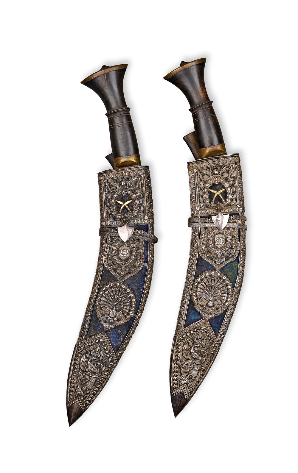 Lot 300: A PAIR NEPALESE SILVER-MOUNTED KOTHIMORA KHUKRIS DAGGERS,OF BRITISH RAJ PERIOD DEHRA DUN, 19TH CENTURY