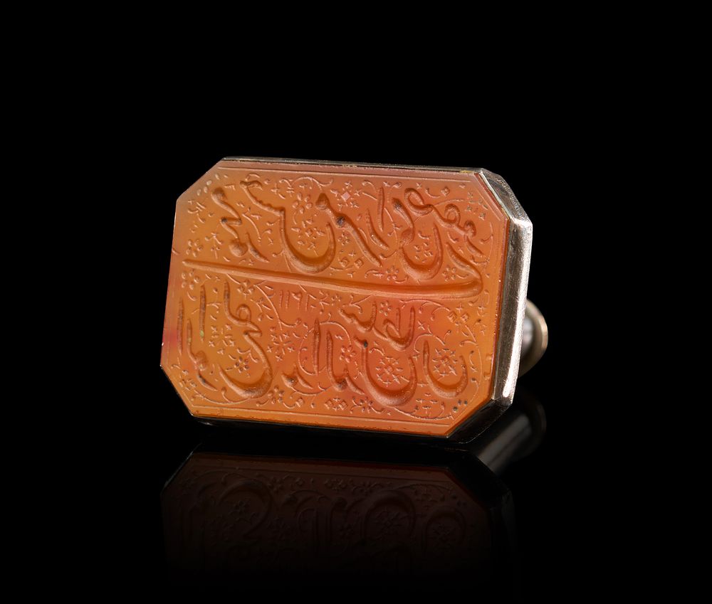 Lot 278: A LARGE DATED ISLAMIC SILVER MOUNTED CARNELIAN INTAGLIO SEAL, 18TH CENTURY