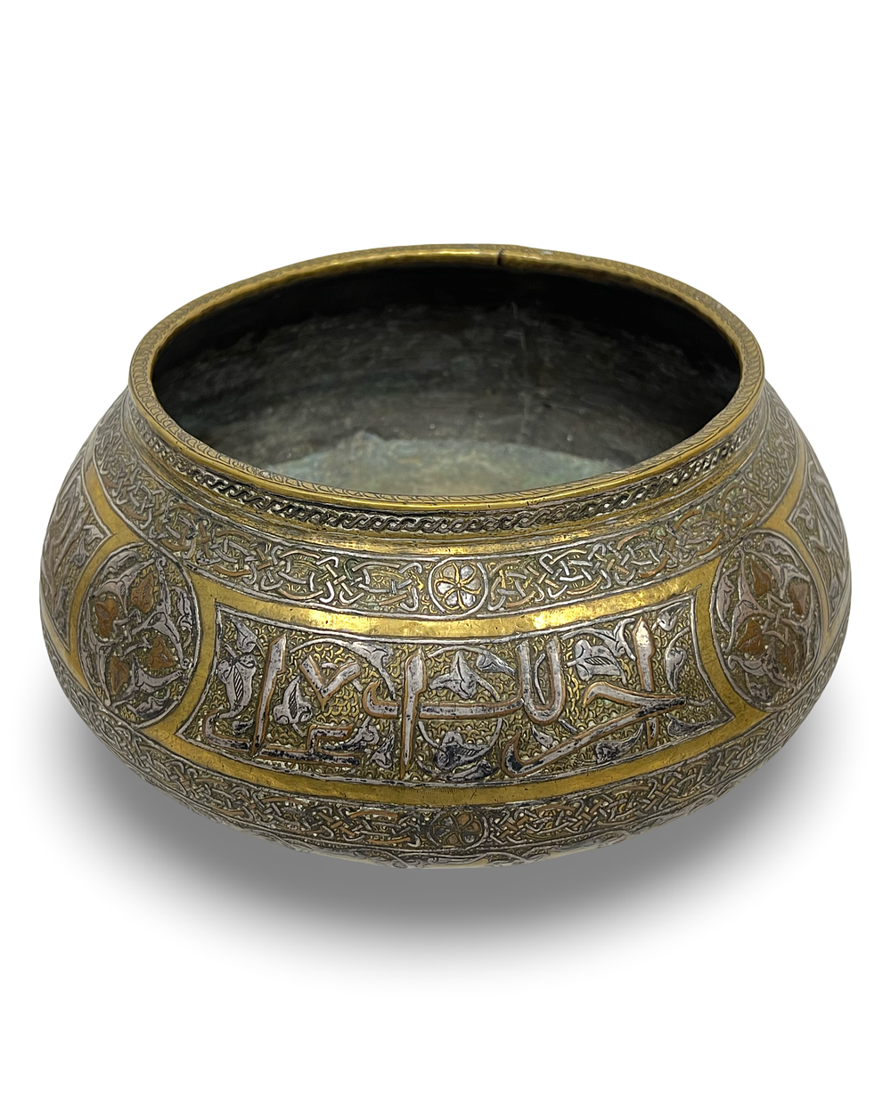 Lot 200: A LARGE MAMLUK REVIVAL SILVER AND COPPER INLAID BRASS BOWL, CIRCA 1900S