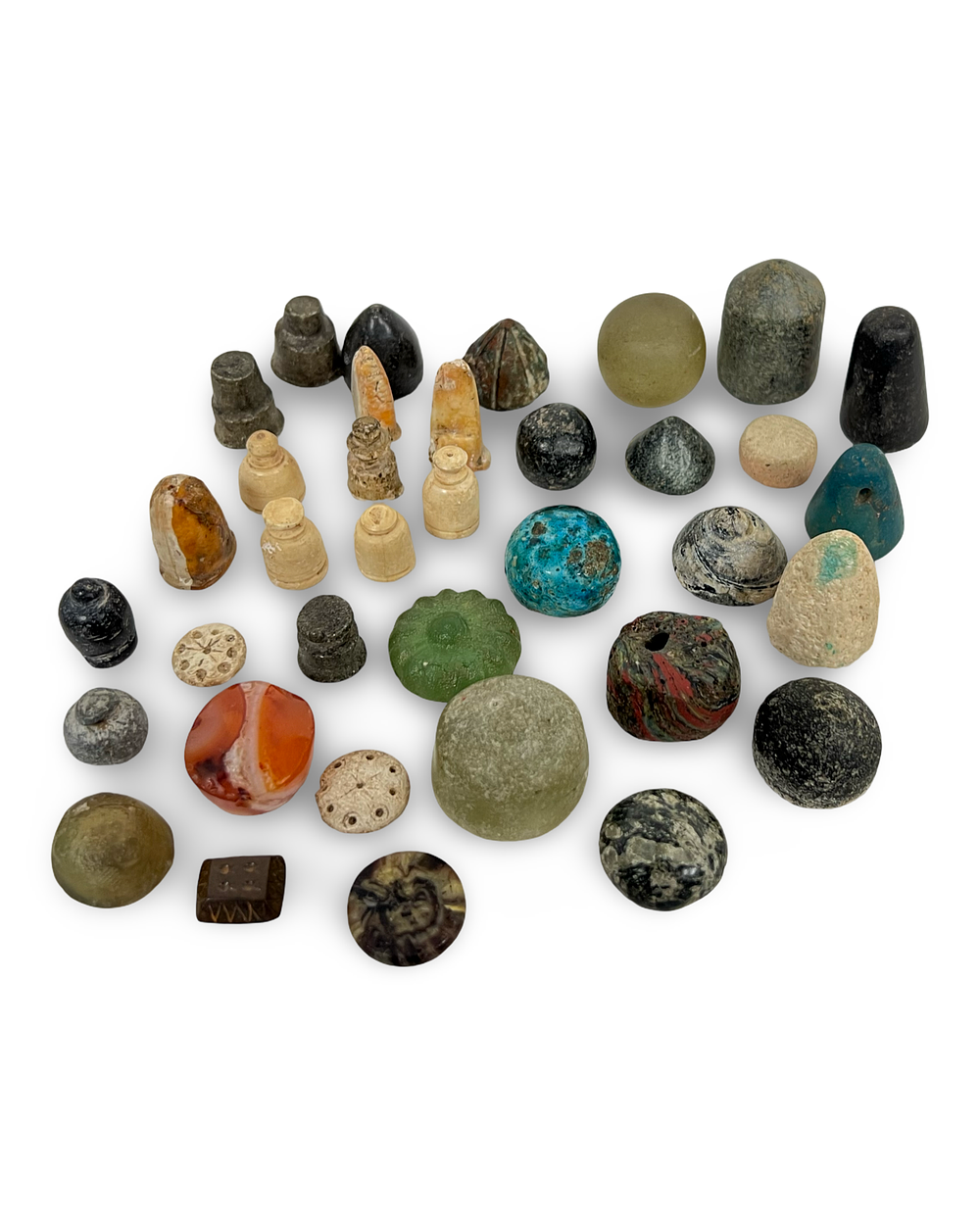 Lot 166: AN ASSORTMENT OF ANCIENT GAMING PIECES IN VARIOUS MATERIALS