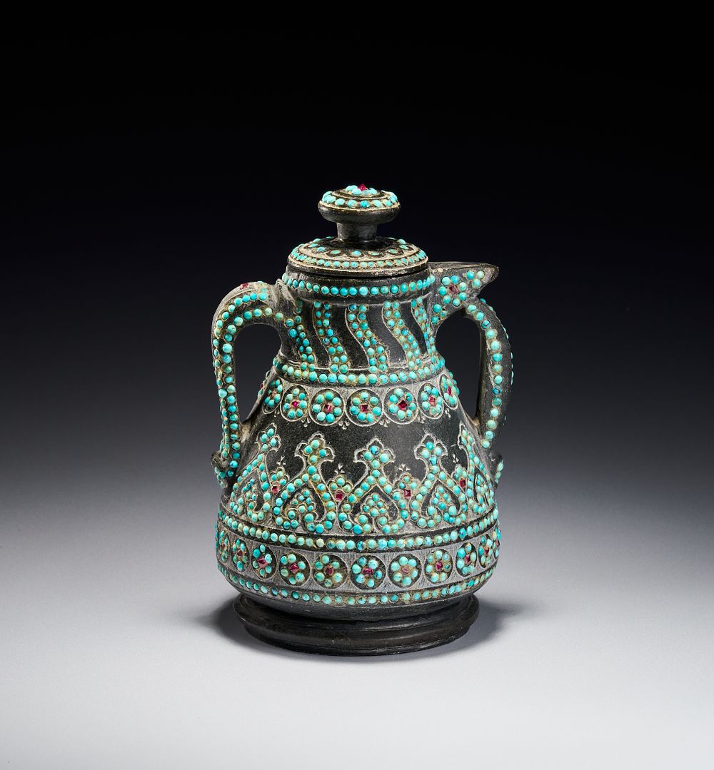 Lot 163: A RARE QAJAR TURQUOISE INSET CARED STONE TEAPOT, PERSIA, 19TH CENTURY