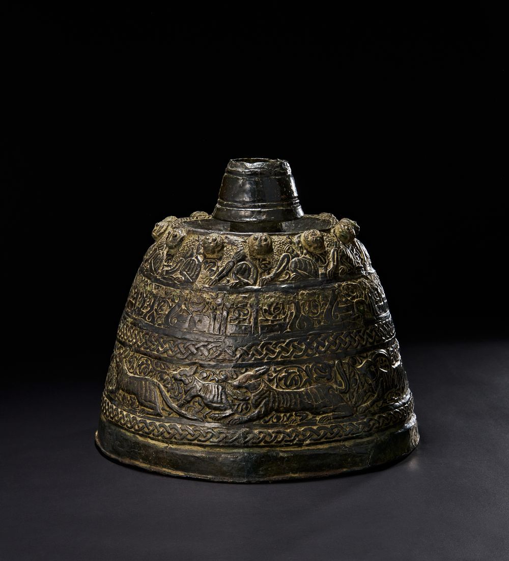 Lot 177: A RARE LARGE SELJUK BRONZE CANDLESTICK WITH KUFIC CALLIGRAPHY, 13TH CENTURY