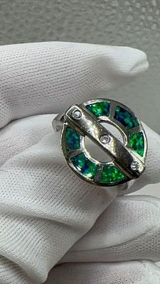 טבעת כסף נדירה משולבת באבן צדף בצבעי ירוק בוהק וזוהר. פתיחה-$35