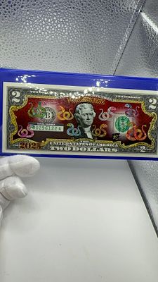 שטר זיכרון $2 אמריקאי מודפס בצבע מלא על שטר של דולר אמריקאי שנת הנחש בסין. 💎 **נדיר**! שטר חוקי 