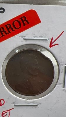 טעות! 1 סנט ארה״ב עם קליפ גדול. טעות במטבע של 1 סנט ארה״ב הוטבע על גלם חתוך ( קליפ) מאוסף 