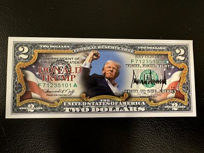 שטר זיכרון של 2$ שיצא לאחר ניסיון ההתנקשות בנשיא טרמפ.