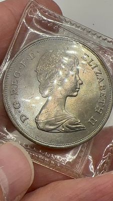 מטבע אליזבת השנייה. 👑 מטבע **נדיר** עם דיוקן המלכה אליזבת השנייה! 🪙 פריט אספנות **מדהים** עם 