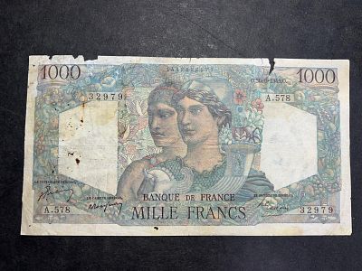 1000 פרנקים צרפתיים מסוג "מינרווה והרקולס" (Minerve et Hercule), שהונפק בשנת 1945.