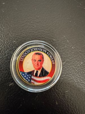 מטבע מיוחד מאוד חוקי ונדיר מצופה זהב 24K של Quarter. מסידרת נשאי ארה״ב. הנשיא לינדון ג׳ונסון