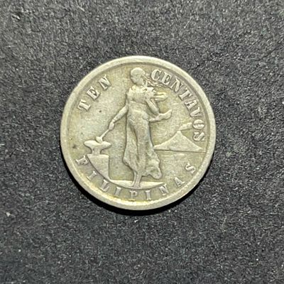 מטבע כסף 10 סנטאבו (Ten Centavos) מהפיליפינים.
מצד אחד מופיע העיצוב המפורסם של תקופת חסות ארצות 