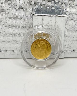נדיר! 
מטבע זהב טהור 1/100 בעיצוב גולגולת סוכר. מטבע **זהב טהור** בעיצוב "גולגולת סוכר" מרהיב 