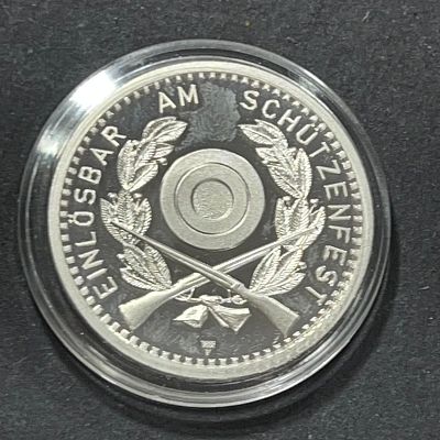 מטבע כסף 50 פרנק שוויץ 1990 
מטבע זיכרון "פסטיבל הירי הפדרלי" 
25 גרם כסף 0.900