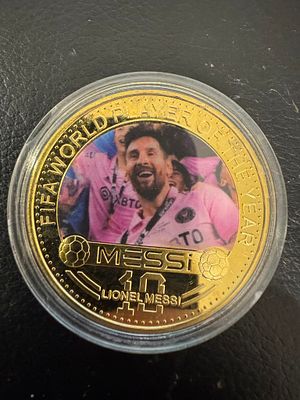 Lionel Messi – Gold-Tone “FIFA World Player of the Year” Fantasy Coin. An impressive gold-tone 