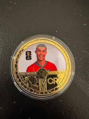 Cristiano Ronaldo – Gold-Tone CR7 “FIFA World Player of the Year” Fantasy Coin. An impressive 