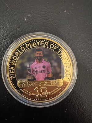 Lionel Messi – Gold-Tone “FIFA World Player of the Year” Fantasy Coin. A gold-tone fantasy coin 
