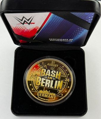 מטבע של WWE 
BASH in Berlin
המטבע מצופה זהב 999
שוקל 45 גרם
מהדורה מוגבלת 9999/0175