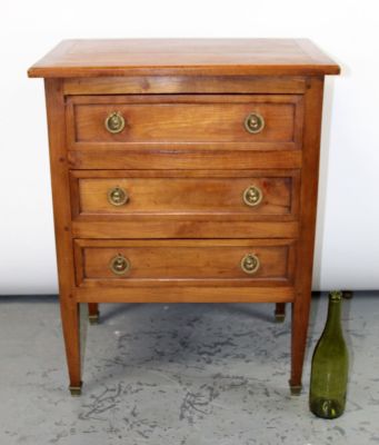French Louis XVI style petite commode on legs. French Louis XVI style petite 3 drawer commode on 