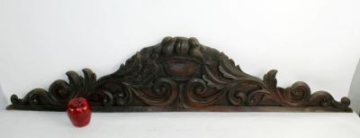 French walnut carved architectural crest with fruited urn. Late 19th century. 47"l x 11"h