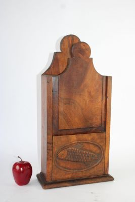 French Provincial carved walnut fariniere (flour box) with fish. Mid 19th century. 23"h x 9 