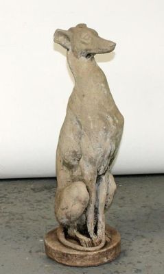 Cast concrete greyhound garden statue. Cast concrete whippet garden statue. Late 20th century. 