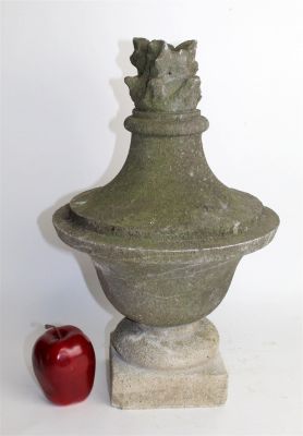 Antique French cut stone garden urn with flame. Early 20th century urn later mounted on cast 