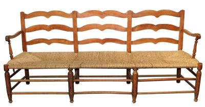 French ladder back farmhouse bench with rush seat. French carved walnut ladder back farmhouse 