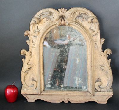 Antique French carved oak mirror. Antique French carved and bleached oak mirror. Late 19th 