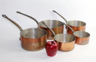 Nest of 5 French copper pots with iron handles. Early 20th century. Sizes range from 2 1/2"h x 