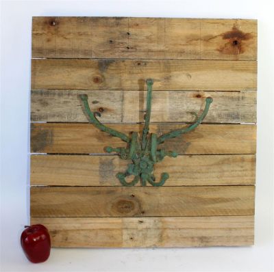 French verdigris iron wall hook on rustic plaque. Early 20th century. 24"h x 23 1/2"w