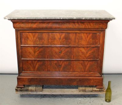 French Louis Philippe commode with marble top. French Louis Philippe commode in flame mahogany 