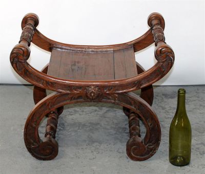 Carved curule curved stool with arms. Carved walnut &amp; oak curule curved stool with arms. 