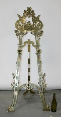 Art Nouveau style bronze floor easel. Decorated with flowers and young girl. Late 20th century. 