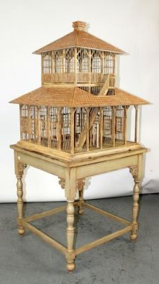 Large wooden birdcage on stand in distressed painted finish. Late 20th century. 64"h x 24 1/2" 