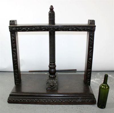Antique French carved oak book press with cherub mask. Antique French carved oak book press with 