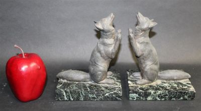 Pair of French cast iron fox bookends on marble bases. Pair of French cast iron fox bookends. On 