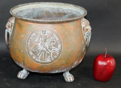 French copper footed cache pot with crest & lion handles. French copper footed cache pot with 