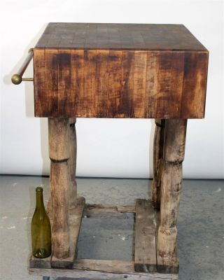 End Cut 10" butcher block on turned legs. 20th century. 34 1/2"h x 27 1/2"w x 24"d