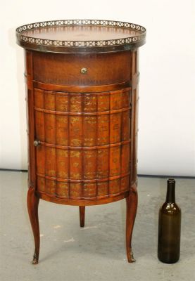 Theodore Alexander faux book cylinder side table with brass gallery. Late 20th century. 30 